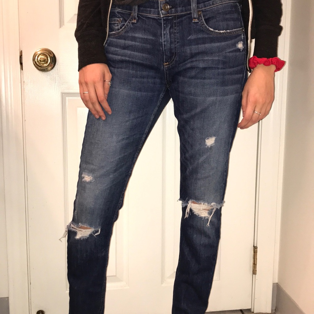 Ripped blue mid rise jeans